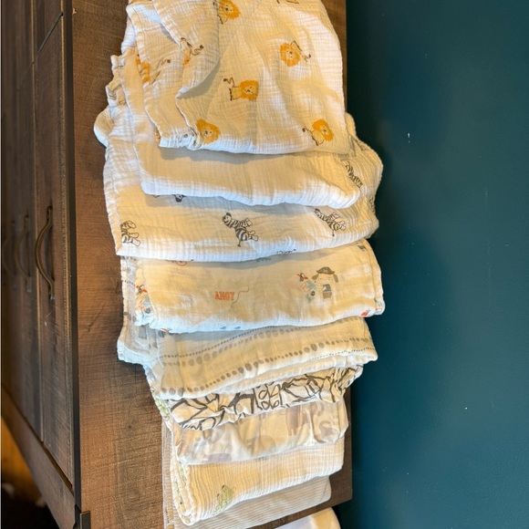 Newborn boy clothes, swaddles, hats and mittens